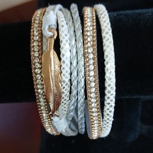 Elegant Gold and Silver Feather Bracelet